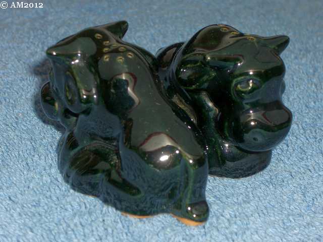 Bull shakers glazed onyx black, cursive holes